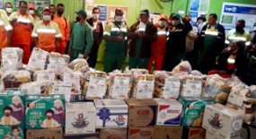  Funcionários da Loga Vila Maria doam cestas básicas para colegas afastados